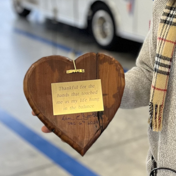 Booth gave a heart with the inscription "Thankful for the hands that touched me as my life hung in the balance" to his caregivers.
