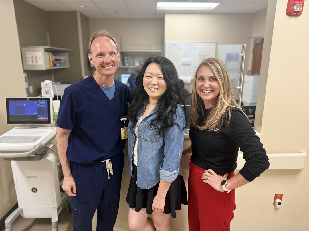Lane pictured with the ED doc who first treated her and an ED nurse, Ashley, who treated her