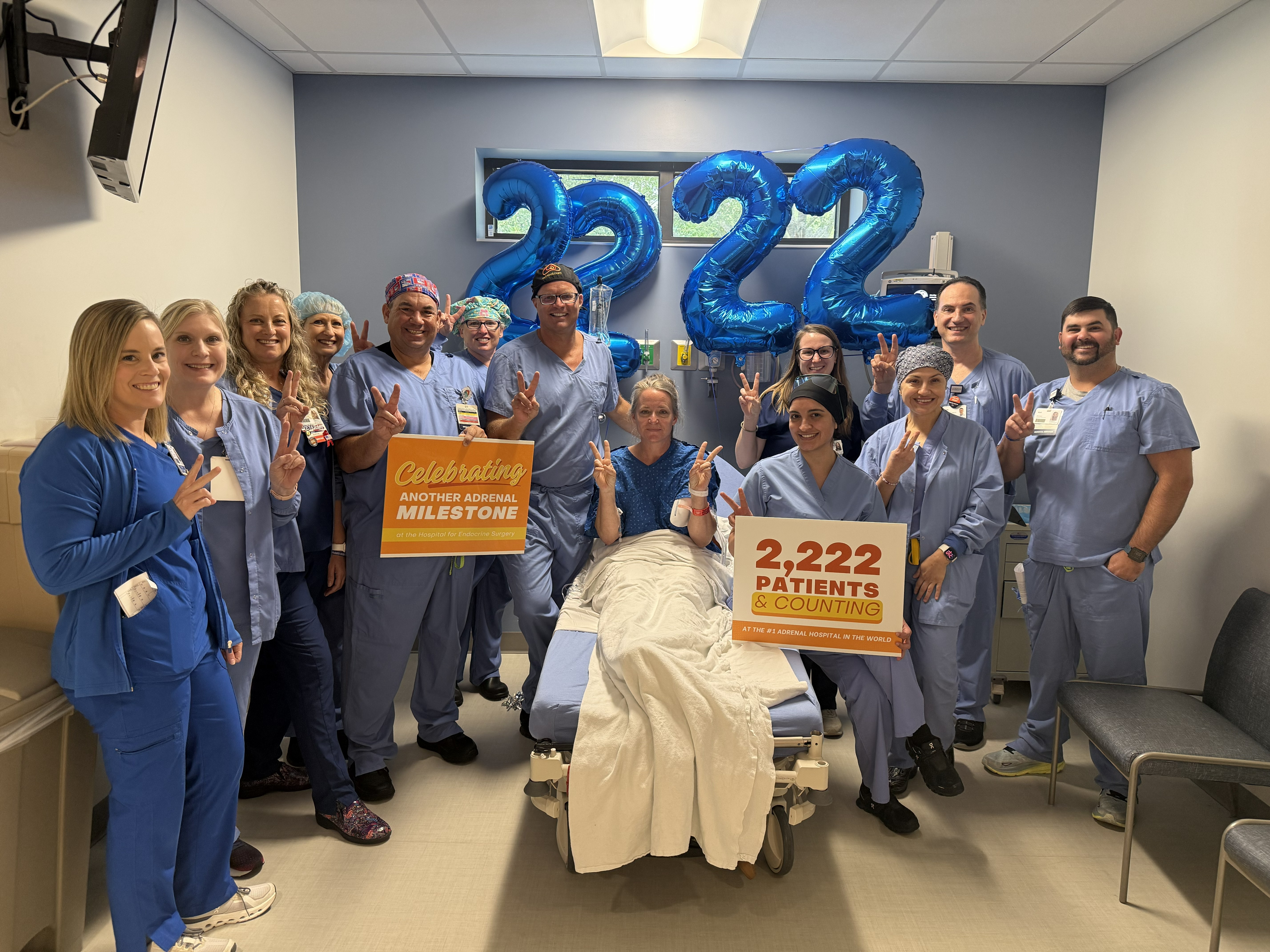 Dr. Tobias Carling, board-certified Adrenal Surgeon, celebrates the 2,222 adrenal surgery procedure with the patient and surgery team at the Hospital for Endocrine Surgery.
