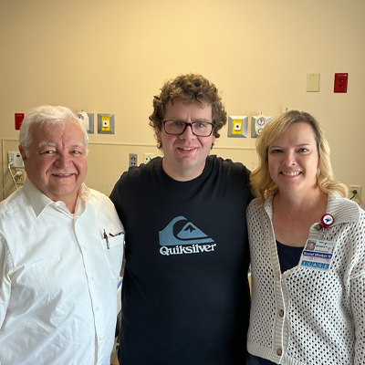 Duncan Norris (center) with Stephen Pain (left) and Michelle Pryor.