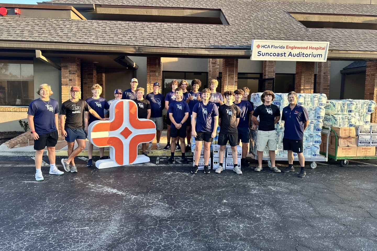 Lemon Bay High School baseball players helped to set up the mini-mart supplies.