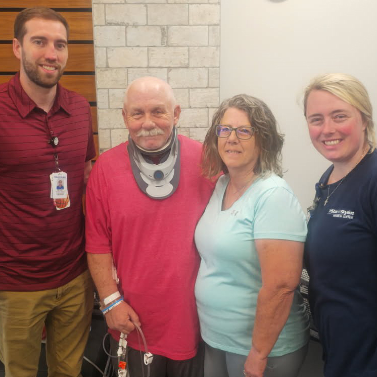 Troy Cessna and wife Leisa with two TriStar physical rehabilitation team members, Wes and Taylor.
