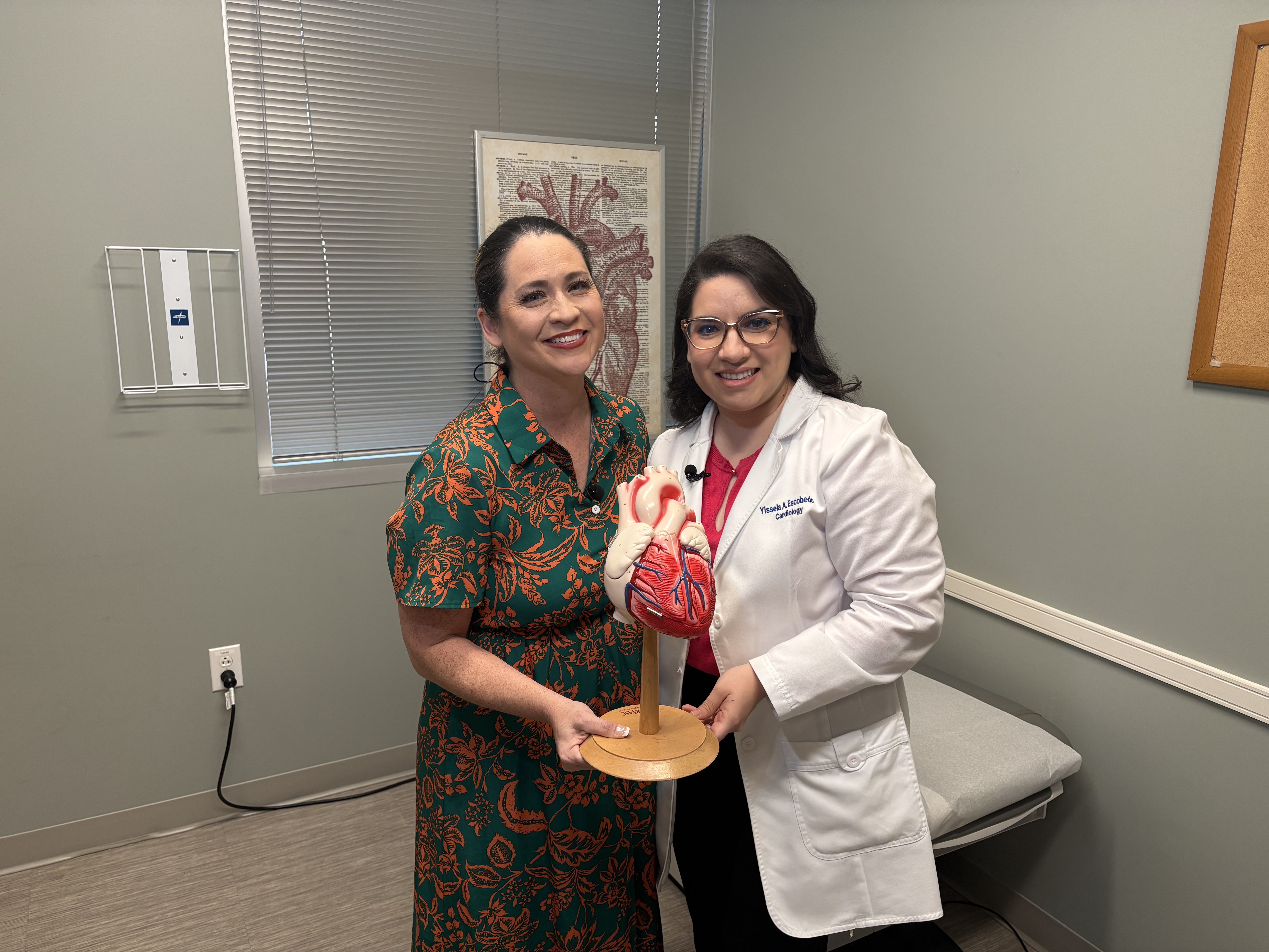 Dr. Yissela Escobedo poses with a KSAT anchor during an SA Live segment.