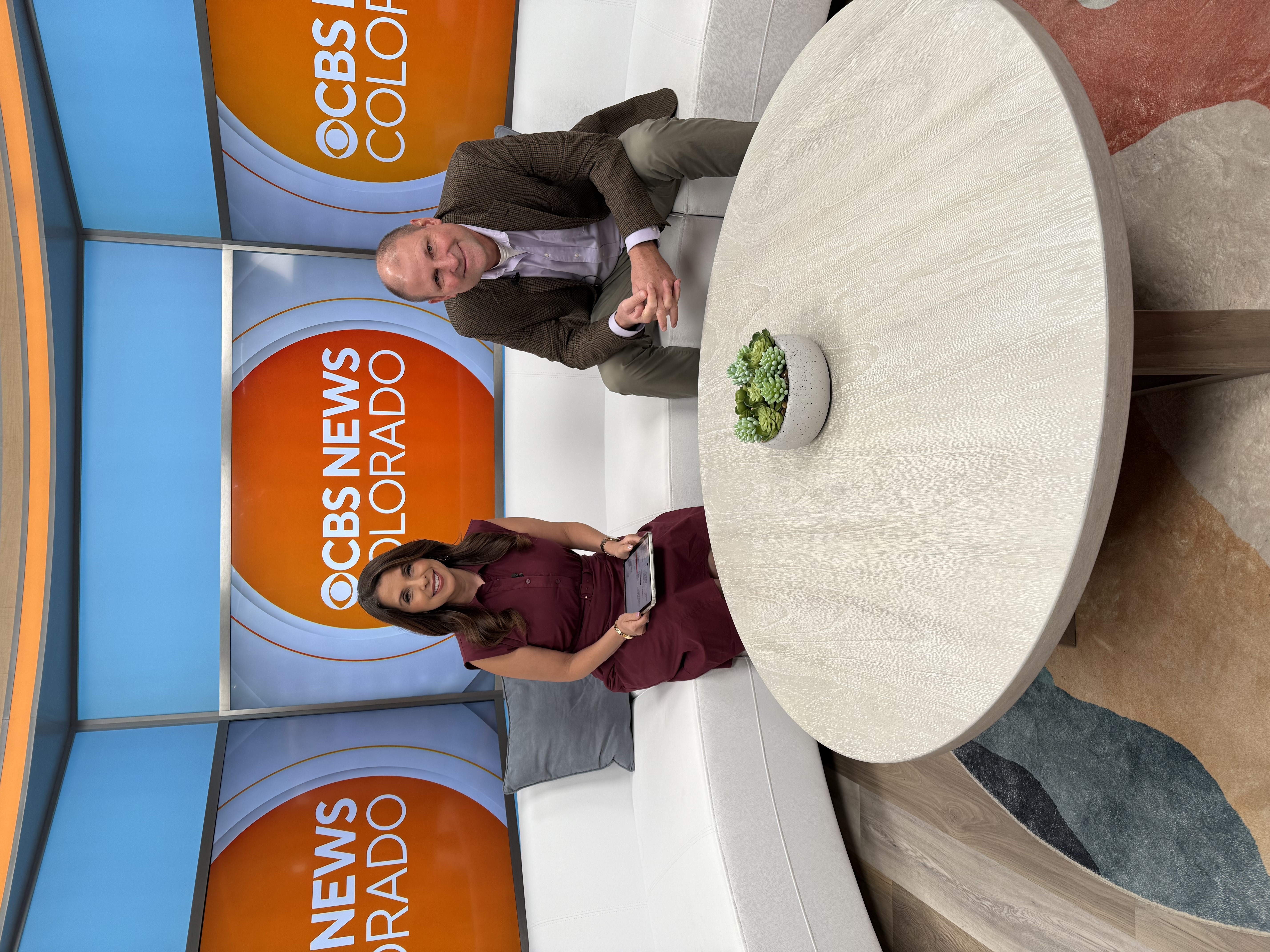 Dr.Van Doorninck on the set of CBS News Colorado with host.