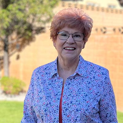 Bonnie Norman smiling outside.