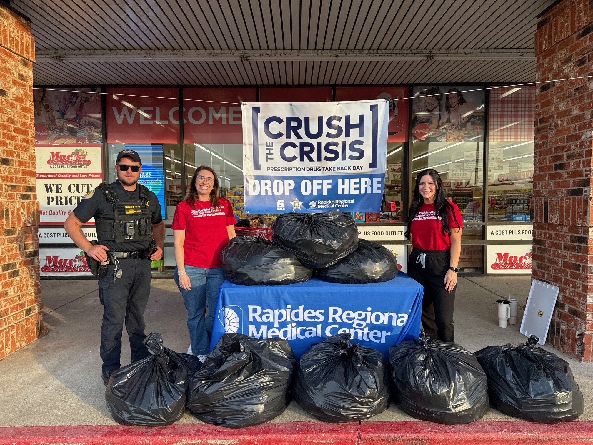 A Rapides Parish Sheriff's Office deputy and two pharmacists at Rapides Regional Medical Center helped collect 8 large trash bags of expired and unused medications at the Mac's Fresh Market on Jackson Street in Alexandria.