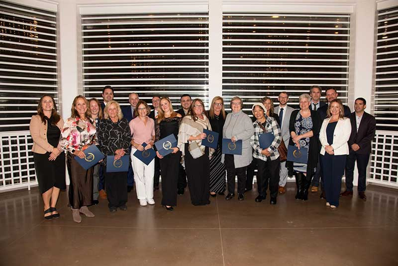 Employees celebrate 20 Year anniversaries, pictured with the leadership teams of Portsmouth Regional Hospital and Frisbie Memorial Hospital.