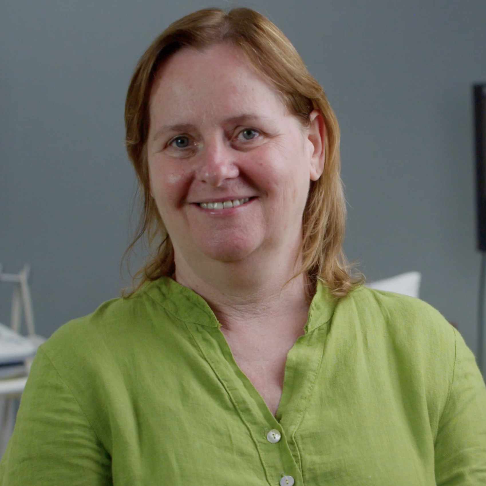 Jean McPhillips smiling in the hospital