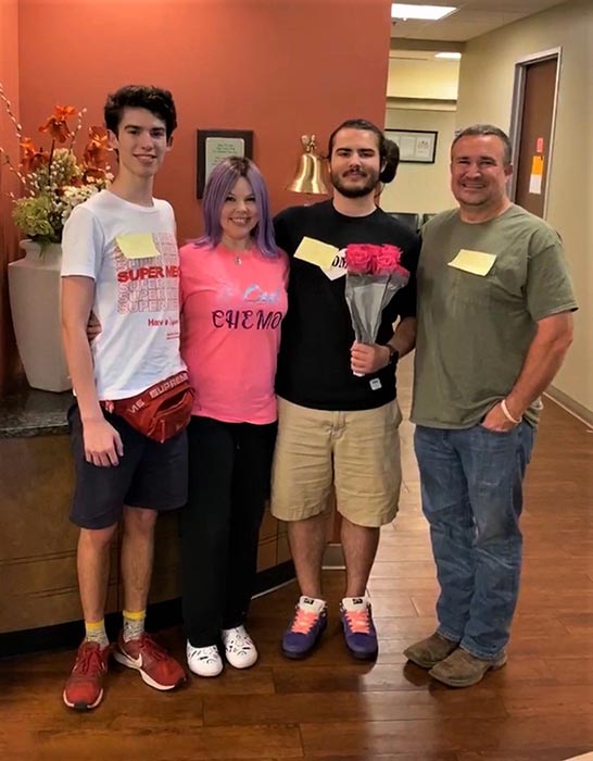 Stacy Ciaschini and her family pose at Methodist Hospital.