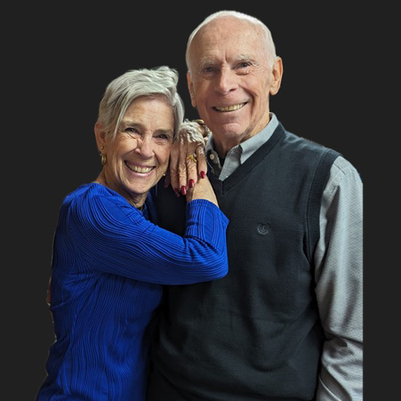 Max and Martha Gessner smiling and hugging