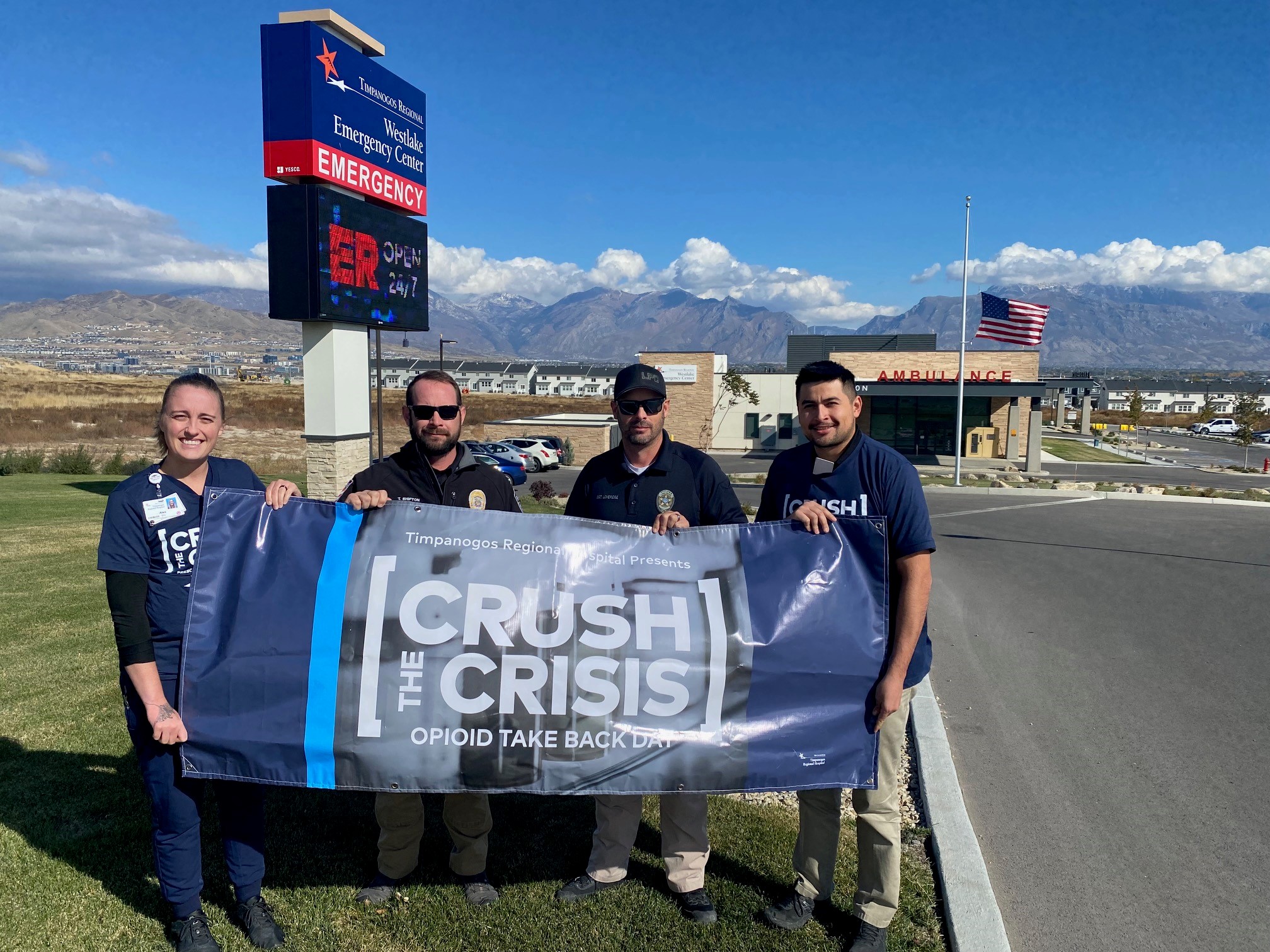 westlake emergency center team holding a crush the crisis banner