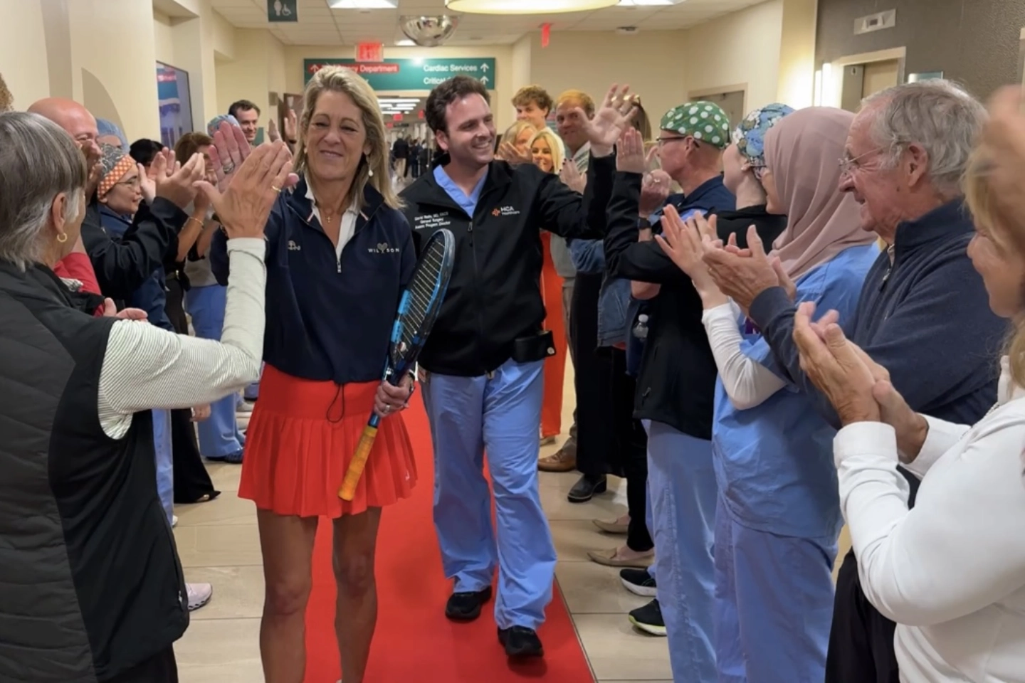 Erin Grimm and red carpet with Dr. David Roife.
