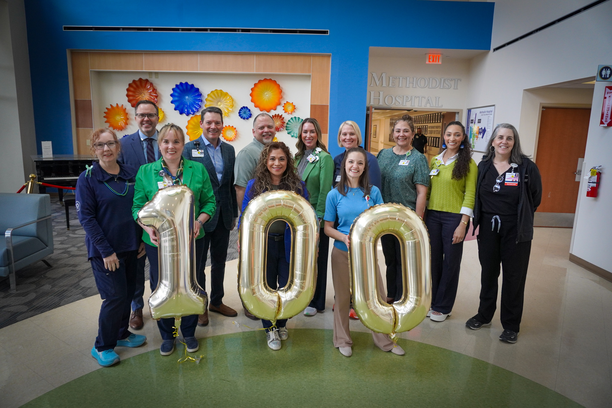 Methodist Hospital Staff Pose with 100 Balloons to Celebrate Top Hospital Award
