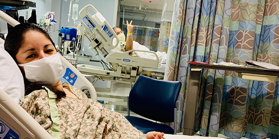 Elisa and Frank in their hospital beds before transplant surgery.