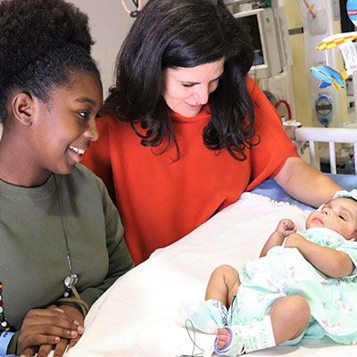 Baby Karmen Chambers with mother Shateria Chambers and Dr. Kristine J. Guleserian.