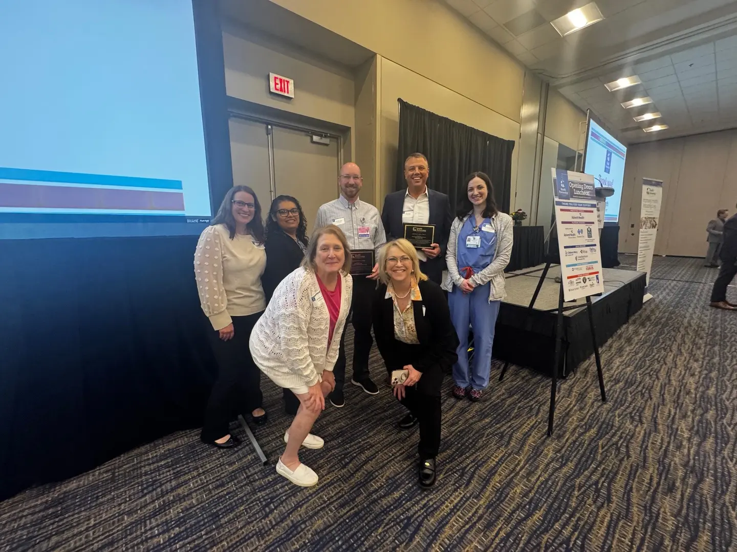 OPRMC and KCWC Staff Celebrate Leadership Impact Award.