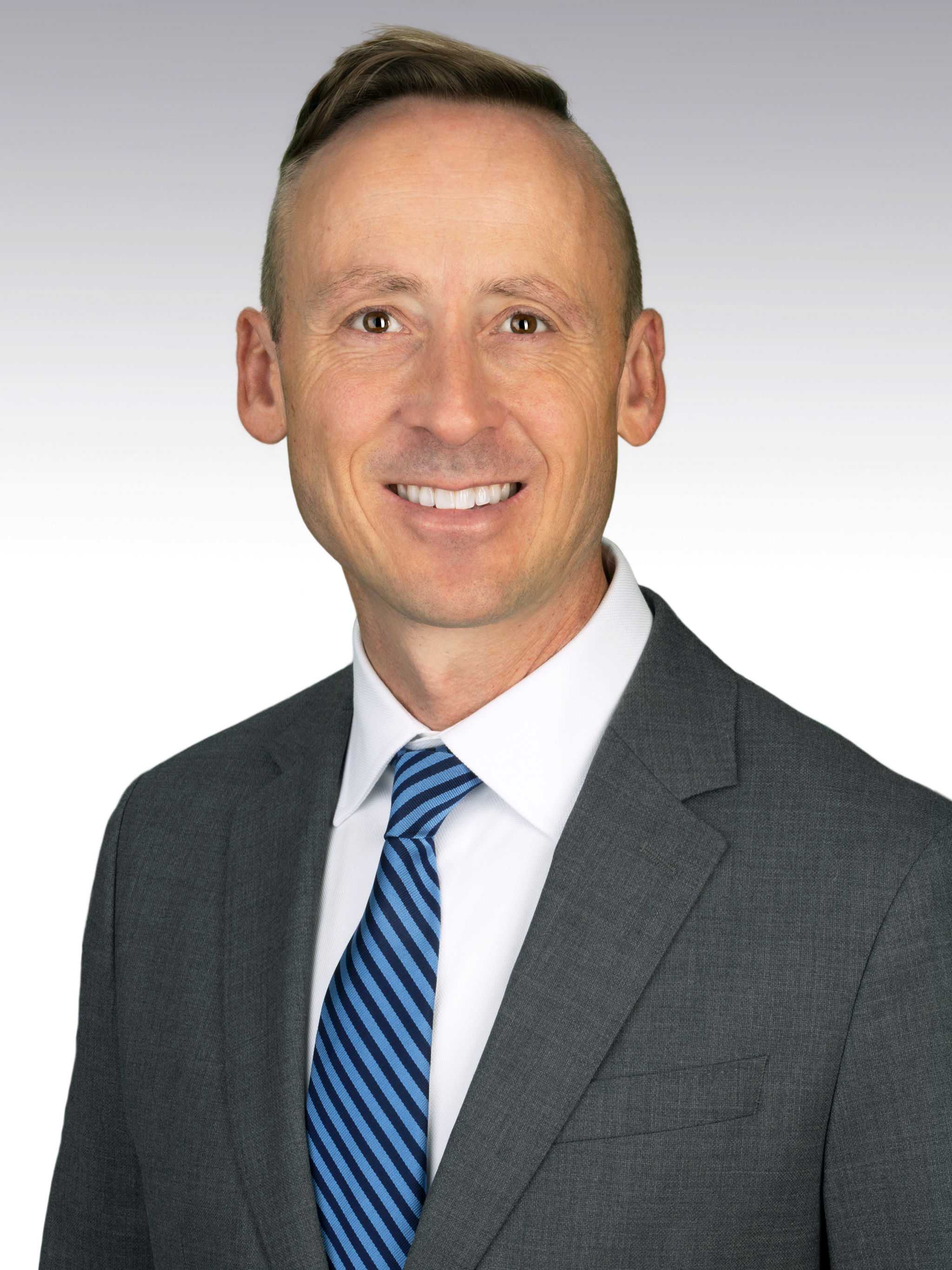 Dr. Jaren Riley professional headshot.