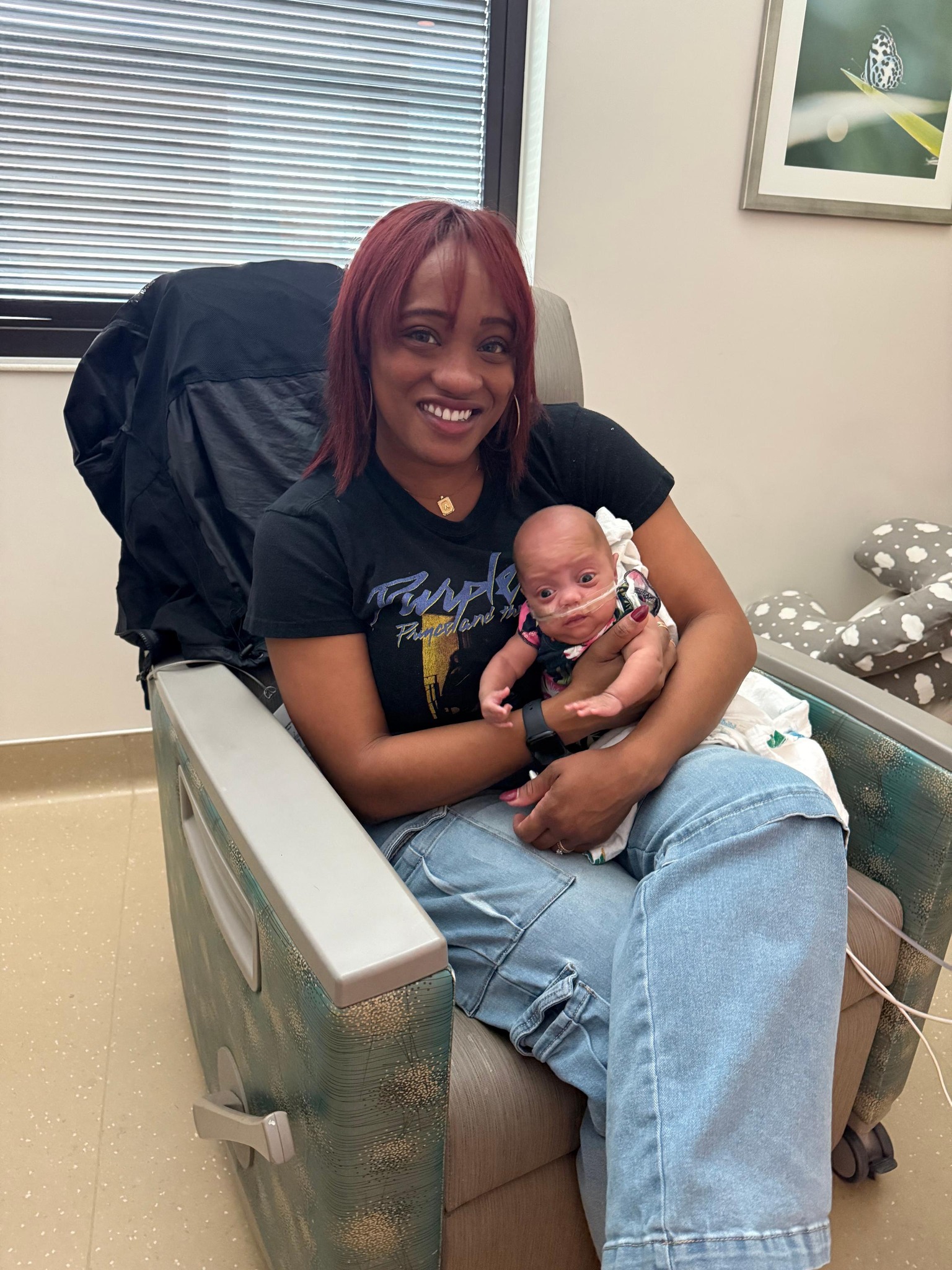 Aliyah and her mom, Amber, pose together in the NICU.