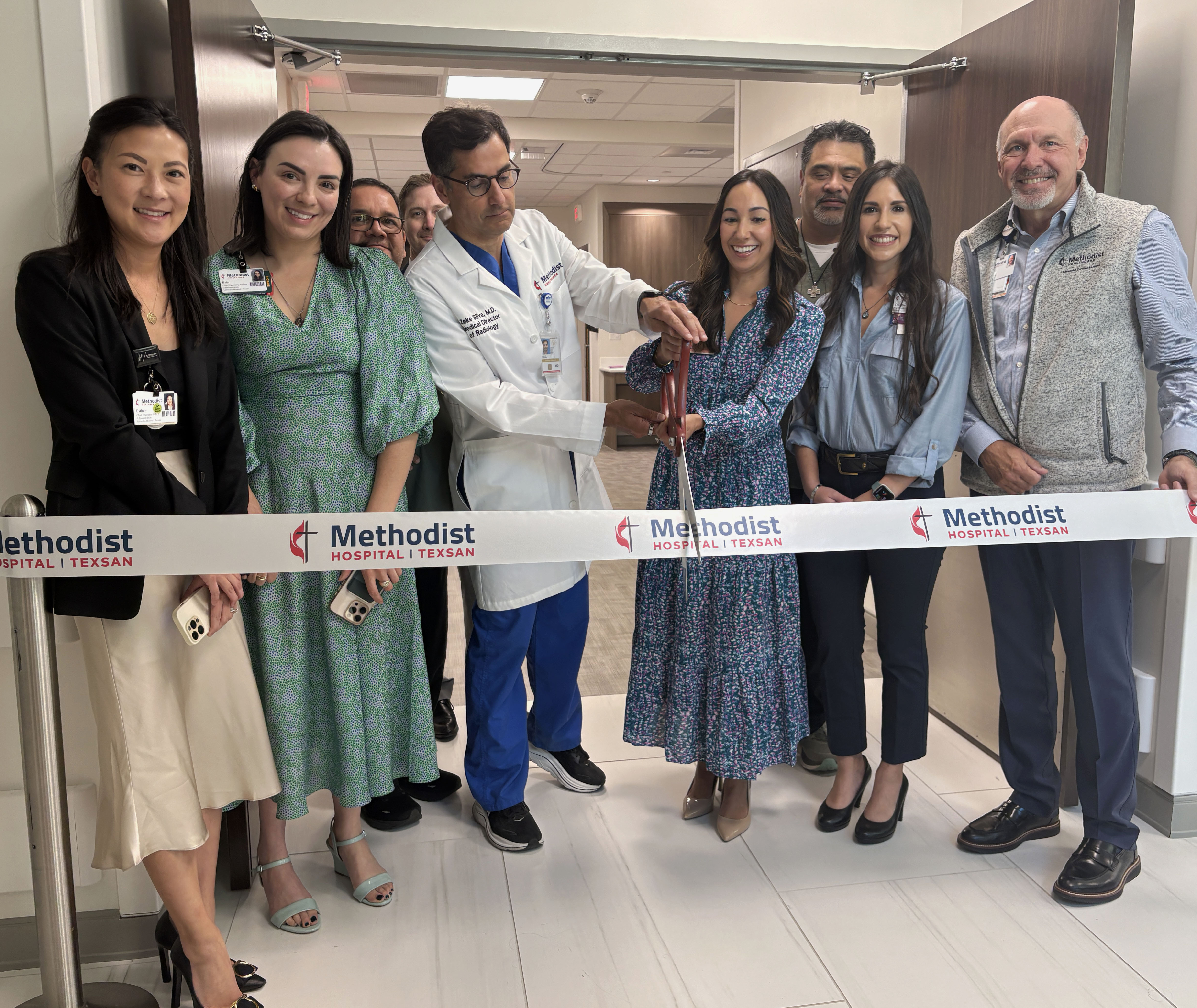 Methodist Hospital Texsan colleagues celebrate the opening of a new MRI center with a ribbon cutting ceremony.