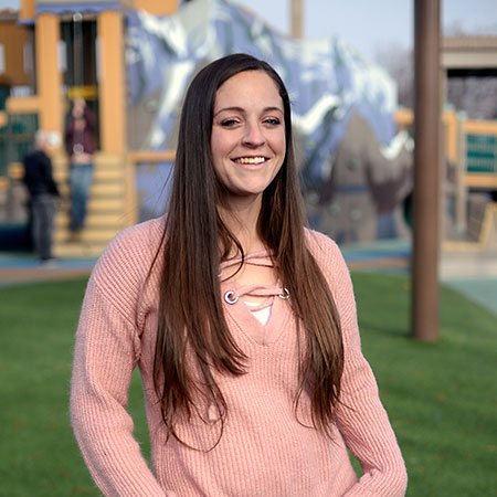 Jennifer Manseau smiling outdoors.