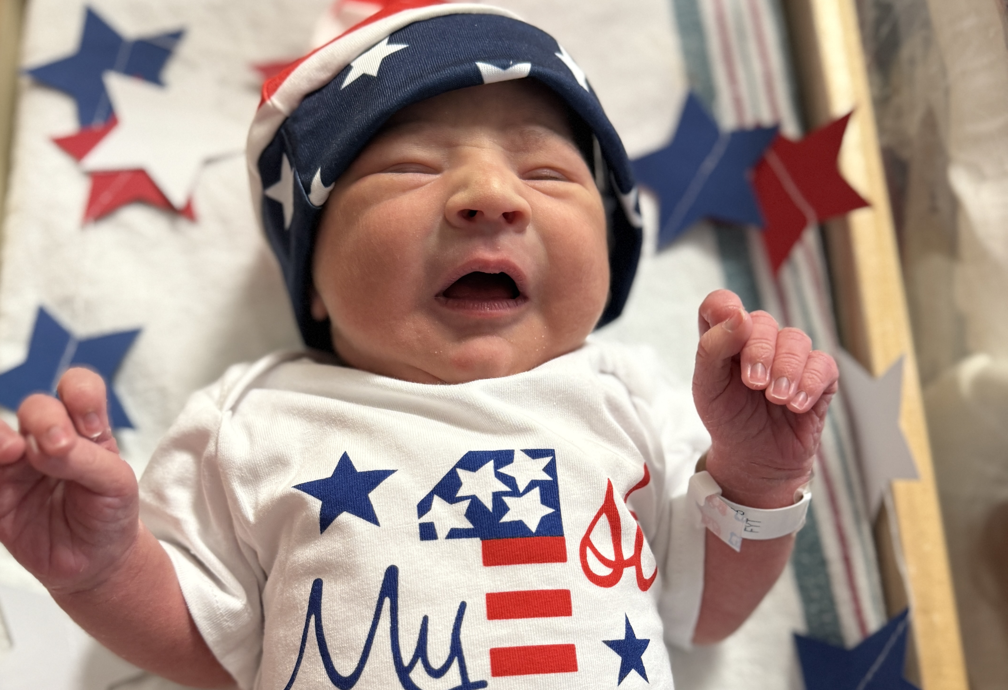 Newborns debuted in their red, white, and blue for the festive holiday