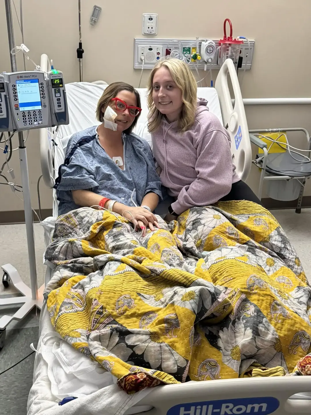 Lindsey in hospital bed with her daughter by her side at TriStar Skyline