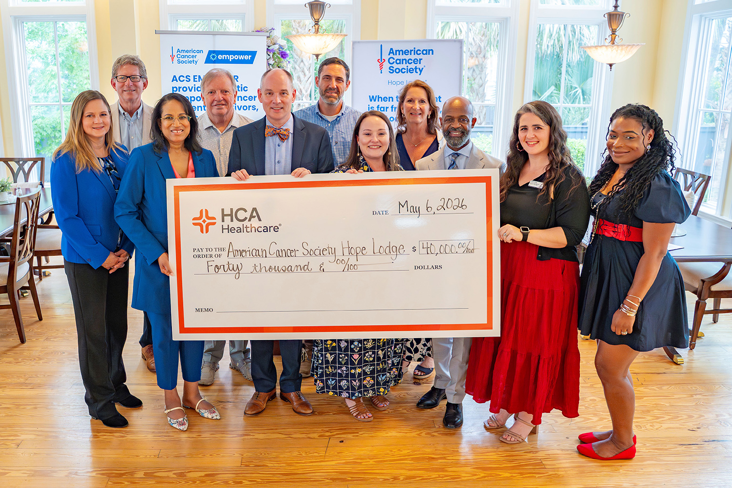 Jeff Wilson, HCA and Hope Lodge team members at check presentation.