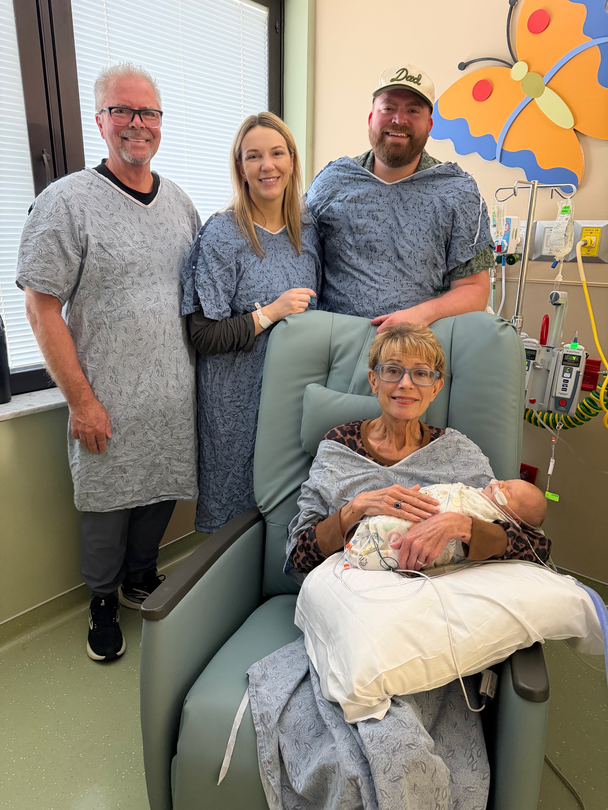 Jordan and her husband, with Tatum and her grandparents