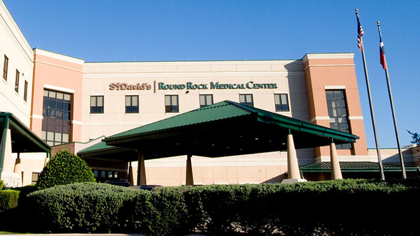 Exterior of St. David's Round Rock Medical Center on a sunny day.