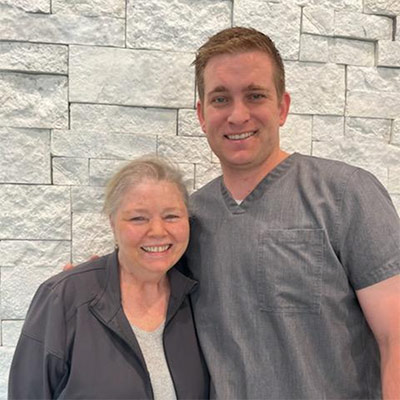 Calleen Marshall and Dr. Riley Rampton smiling together.