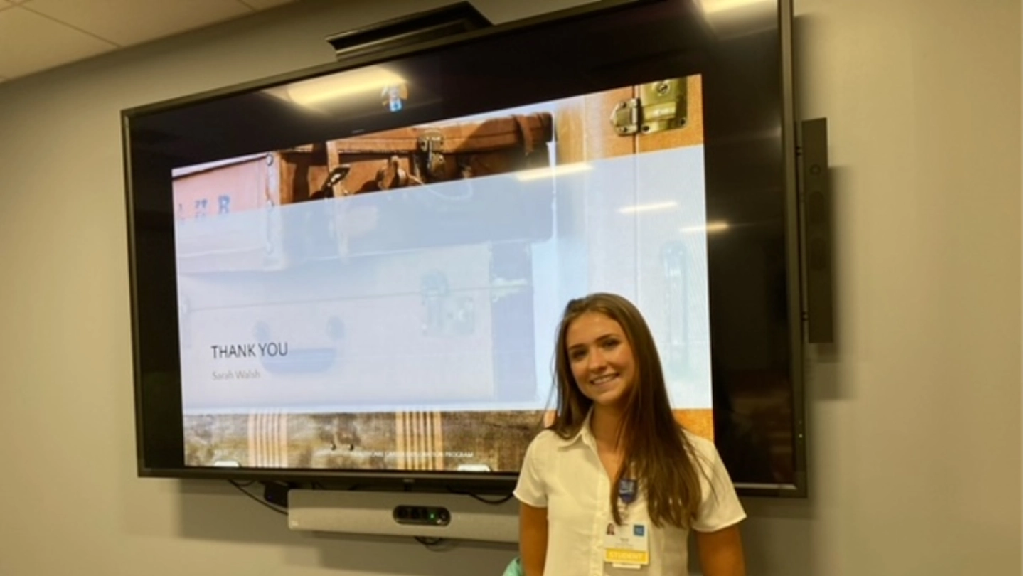 Sarah Walsh presents her final project at the end of her Healthcare Career Exploration program internship.