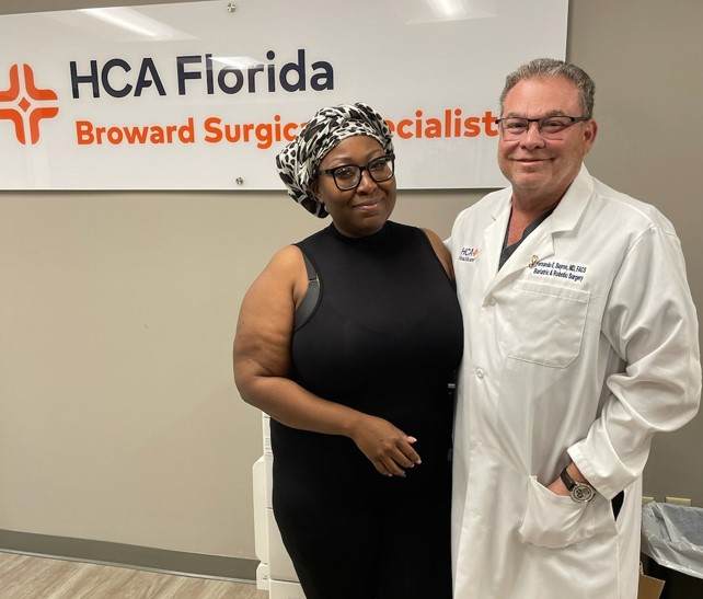 Maddone and Dr. Bayron after surgery.