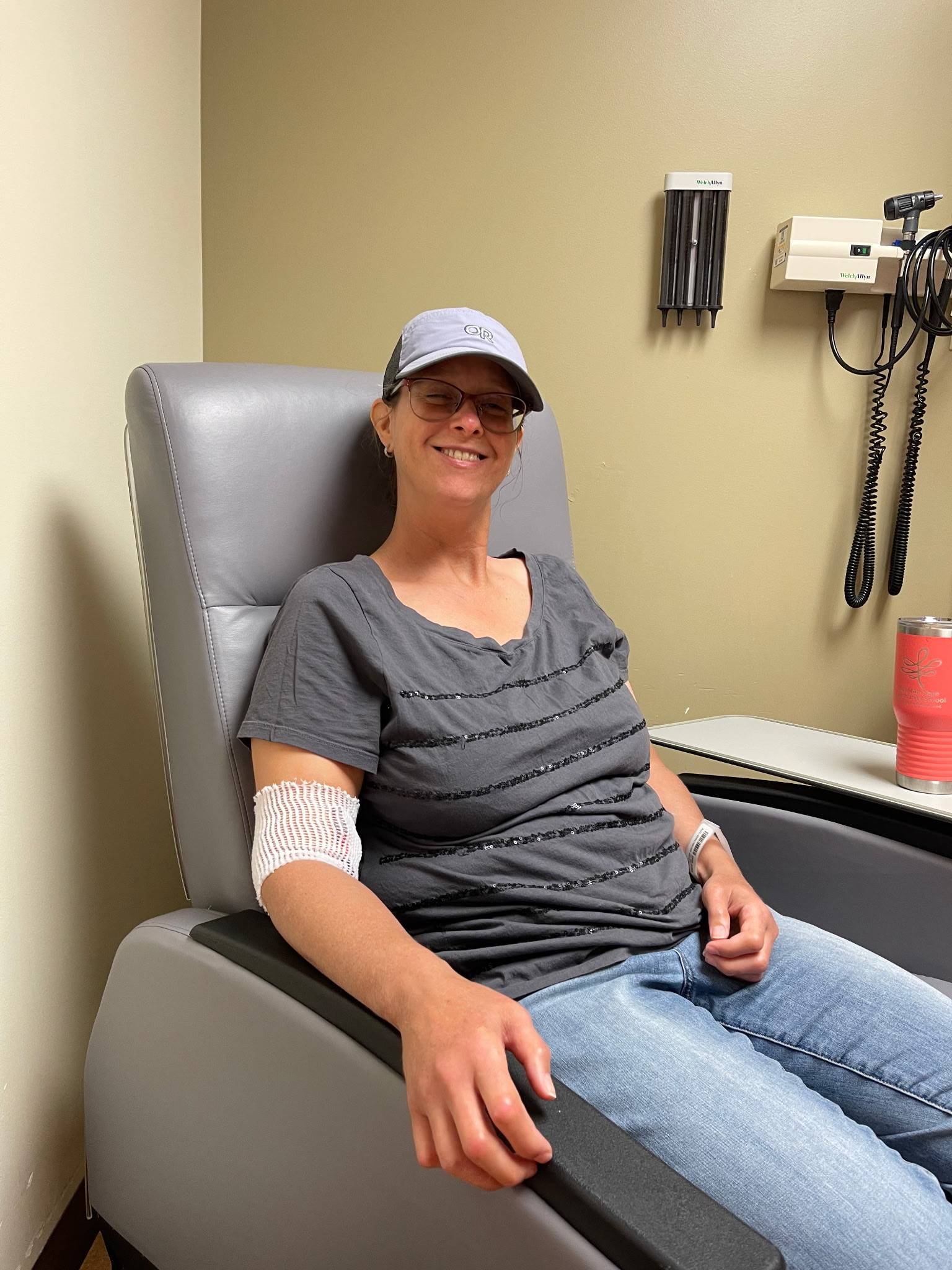 Aimee Ward sitting in chair at hospital