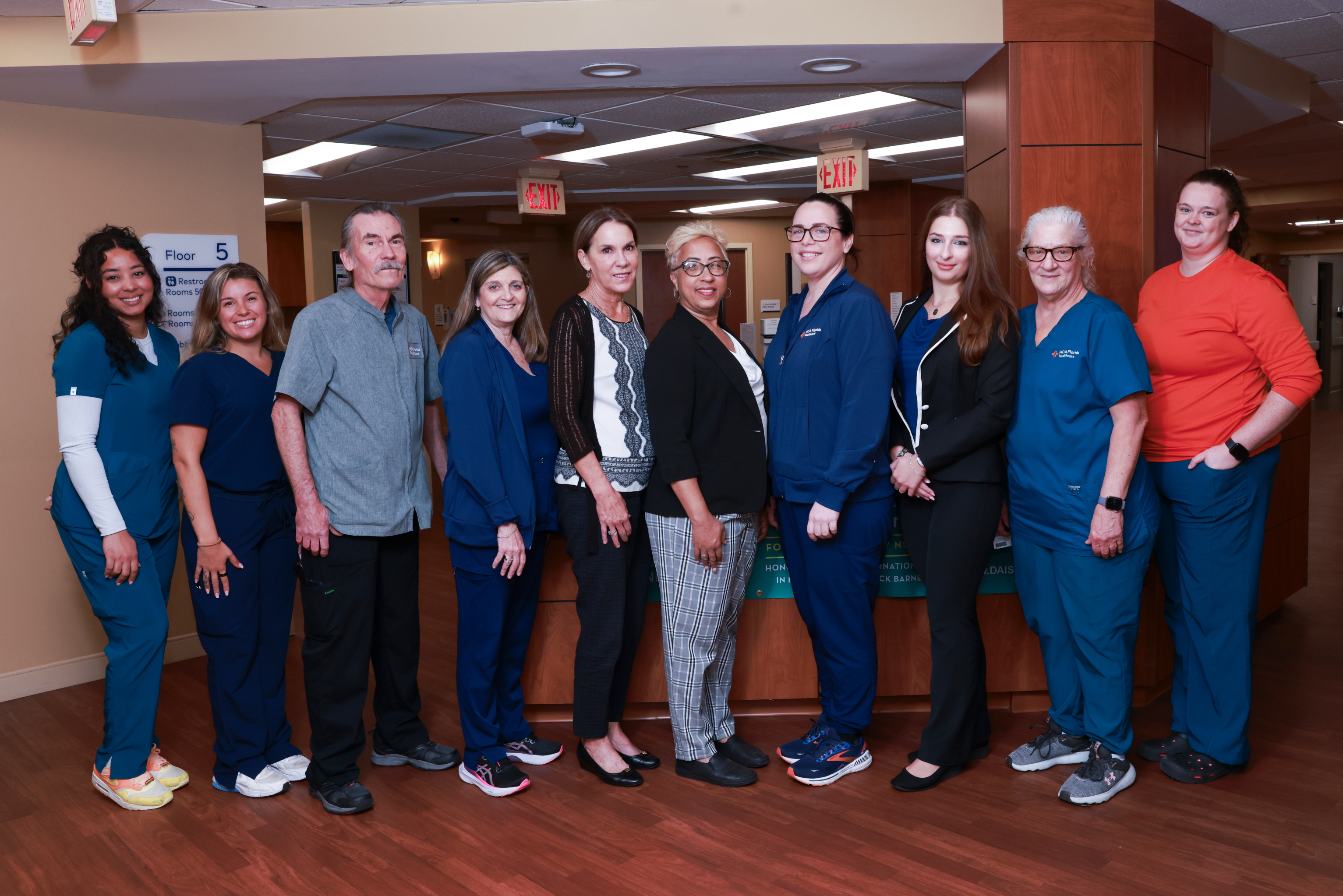 Group of nurses stand smiling