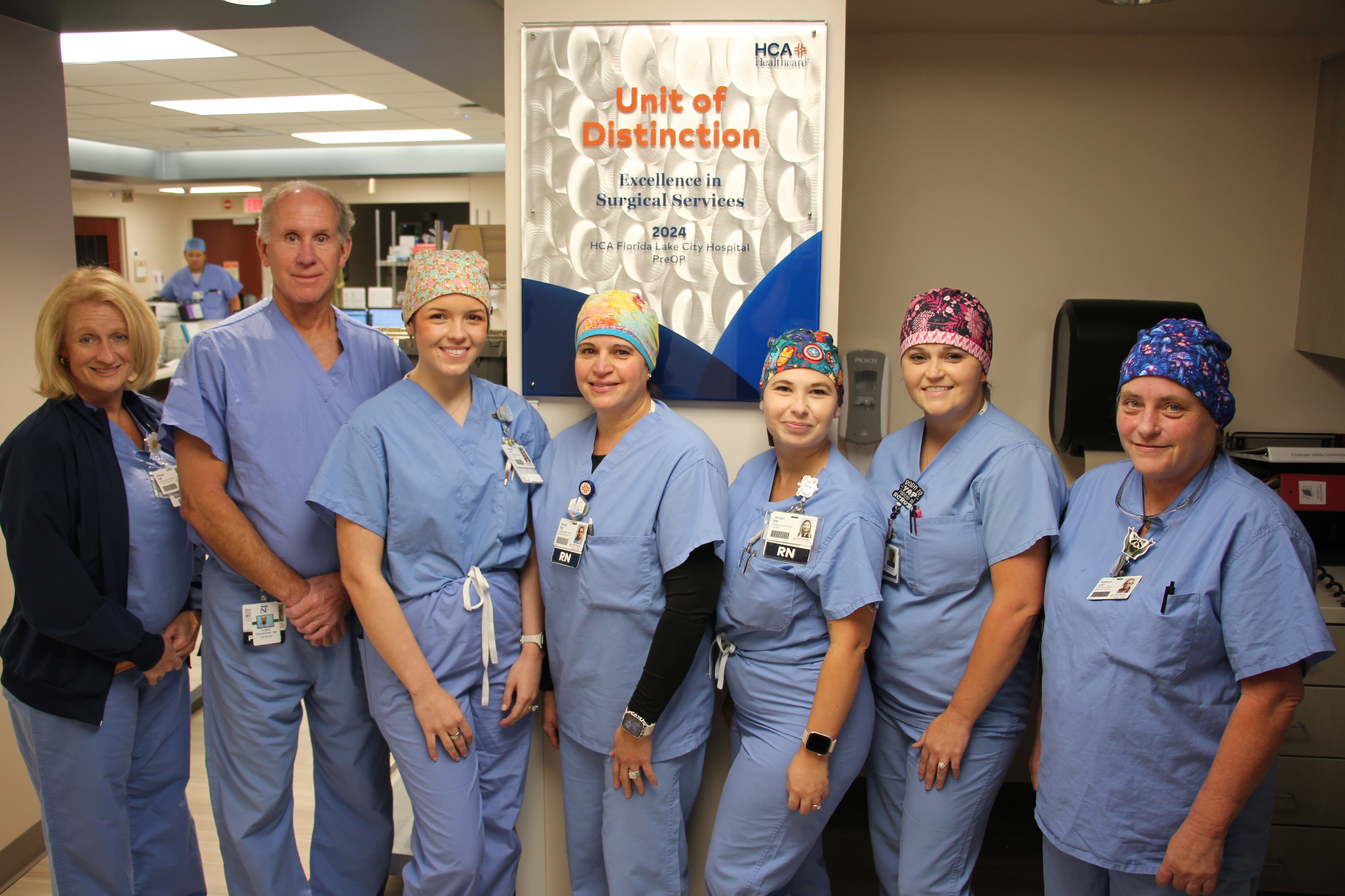 HCA Flordia Lake City Hospital vascular surgery team wearing scrubs in hospital.
