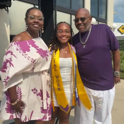 Brion and JaNiece with their daughter at her college graduation.