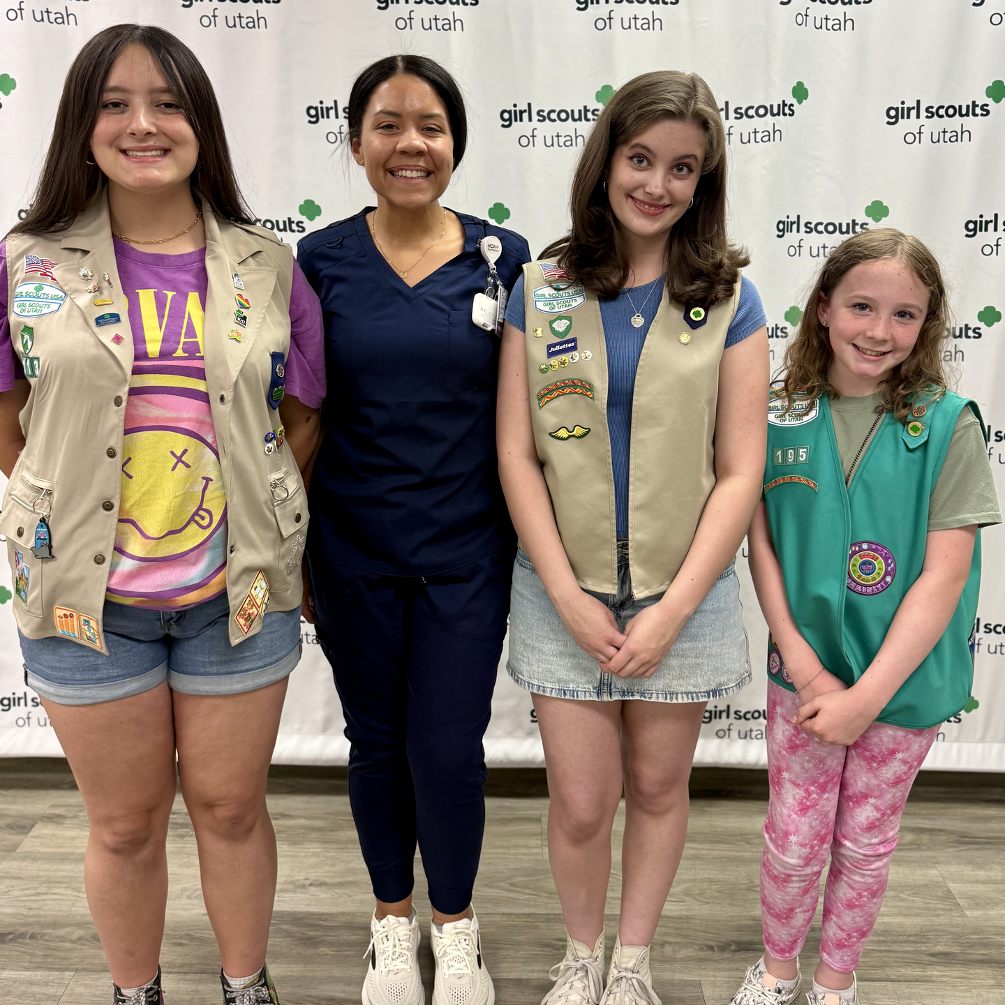 Girl Scouts Pose with HCA Mental Wellness Colleague Network Member.