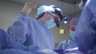 Dr. Elisabeth Potter and St. David's Medical Center surgical staff members performing a procedure.