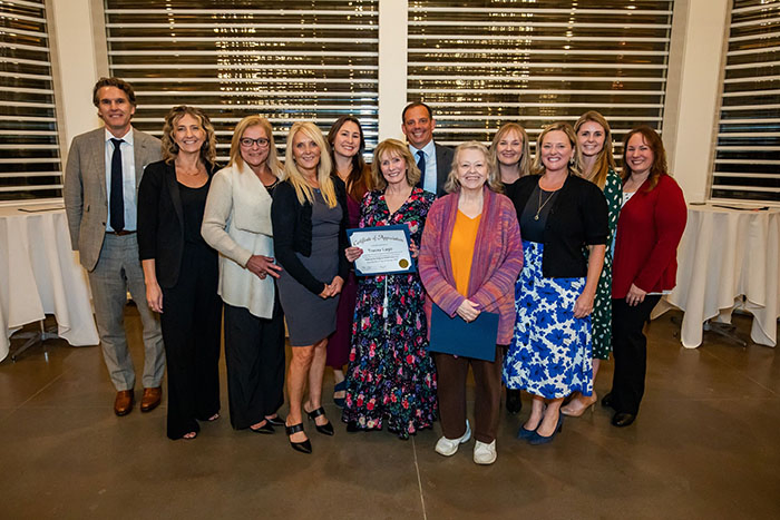 Helen Welsh, Christine Tuttle, Tracey Lago, John Mclain, of Frisbie Memorial Hospital; Michelle Mack, Donna Verville, Michelle Dodd, Tammy Timson, and Clarence Harris, of Portsmouth Regional Hospital, surrounded by colleagues.