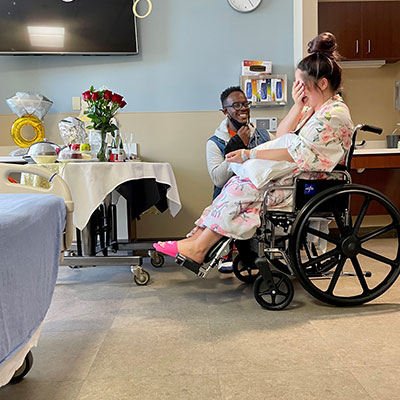 Noellien proposes to Sharlyne in the postpartum unit.
