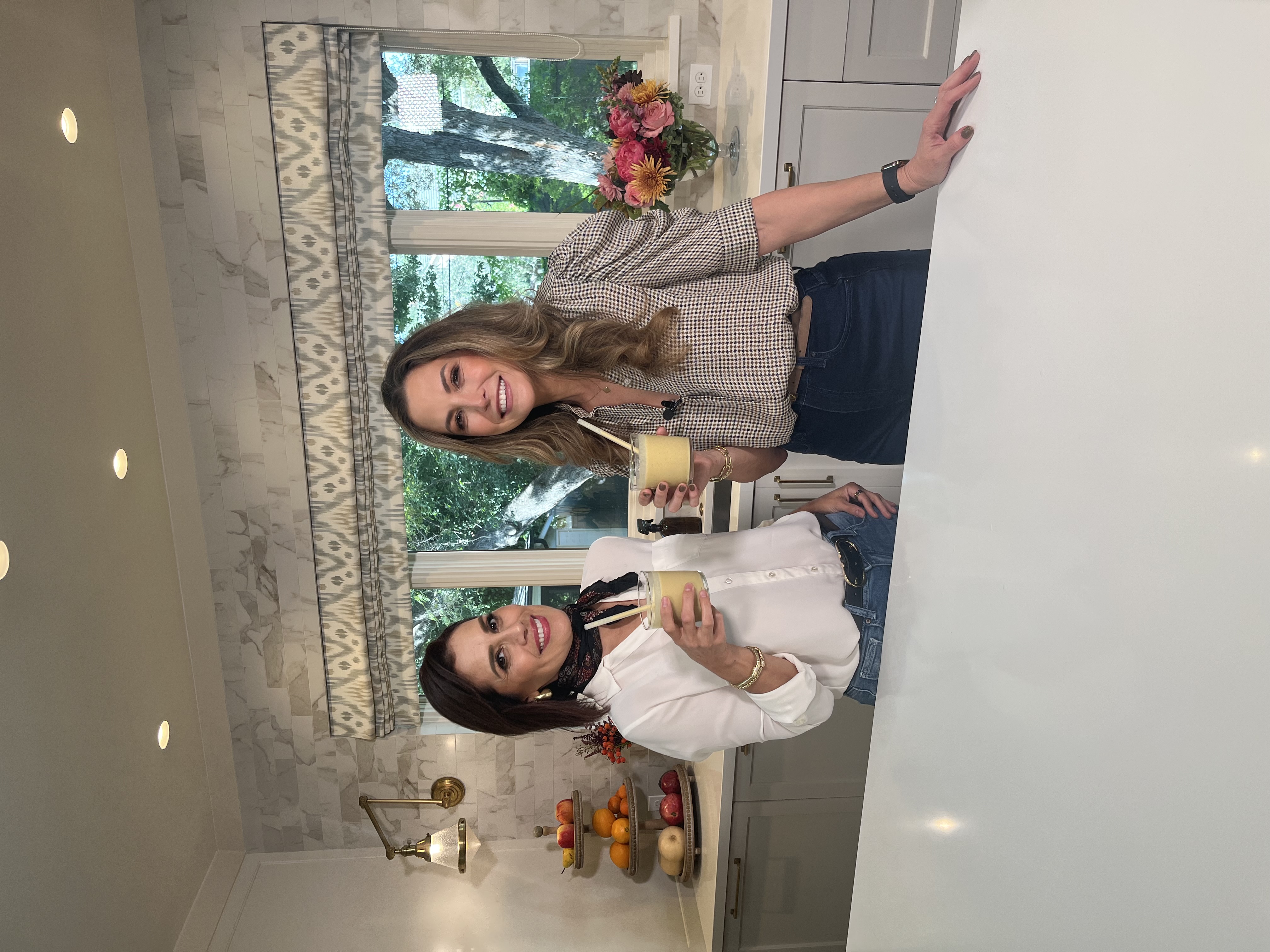 Claudia Zapata-Elliott and Brenda Macias cheers with their protein-packed smoothies.