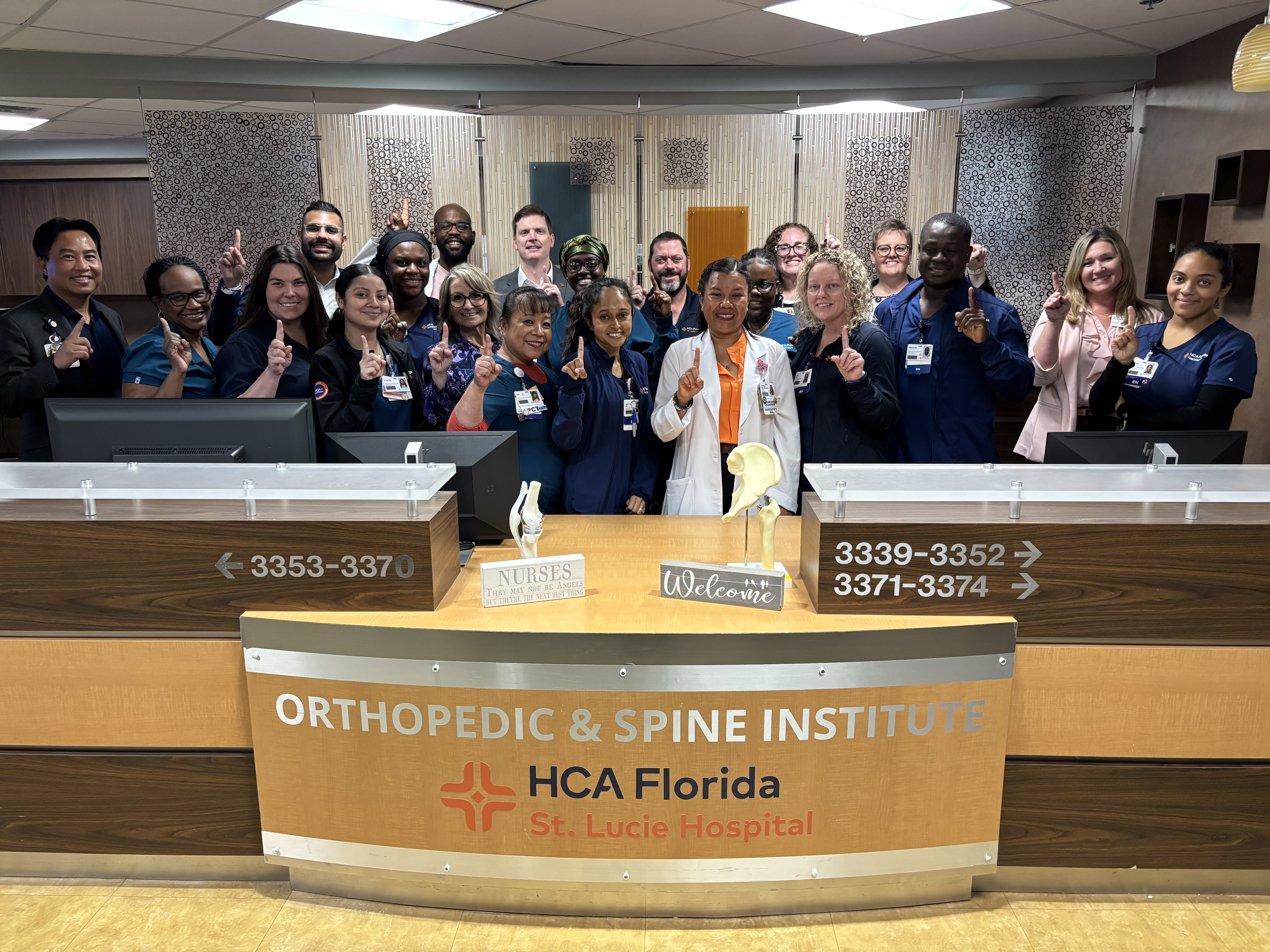 Nurses of HCA Florida St. Lucie Hospital's Orthopedic and Spine Institute are joined by the hospital's senior leaders to celebrate their win.