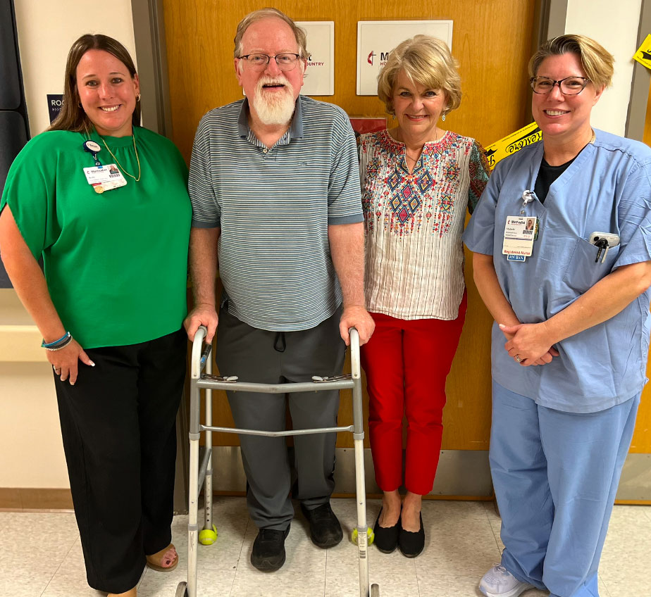 David Ewing and his wife, Teri, stand with colleagues from the Restore program at Methodist Hospital Hill Country.
