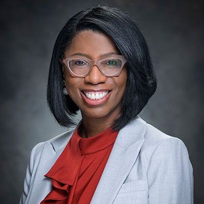 A smiling headshot of Sharn Barbarin, the new CEO of Medical City Arlington.. 