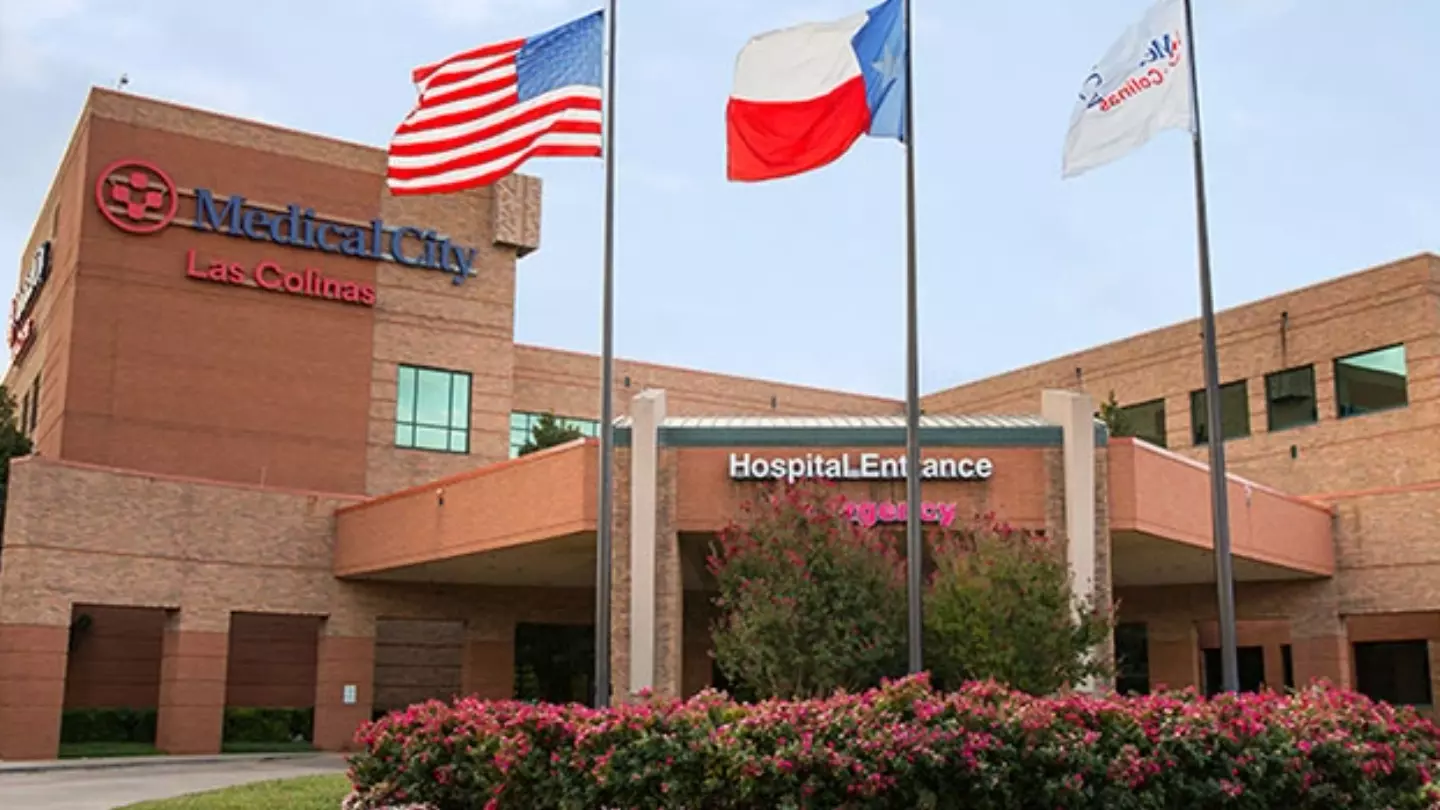 Exterior main entrance of Medical City Las Colinas on a sunny day.
