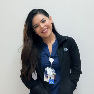 Nurse Karina Cuellar, smiling.