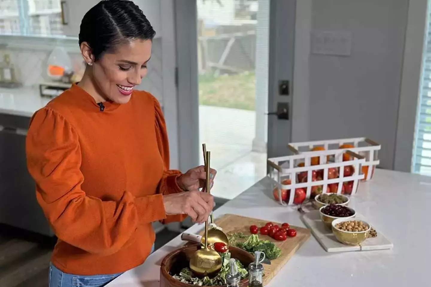 Brenda Macias prepares salad