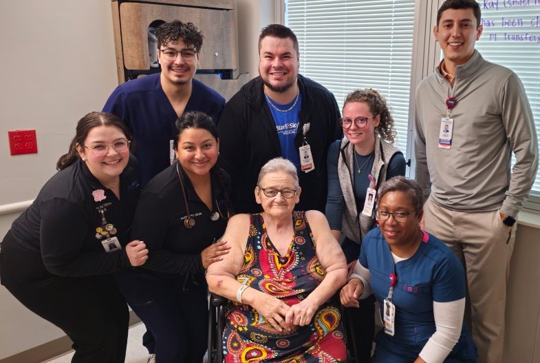 Linda Jackson, a stroke patient at TriStar Skyline, surrounded by her care team in inpatient rehabilitation. 