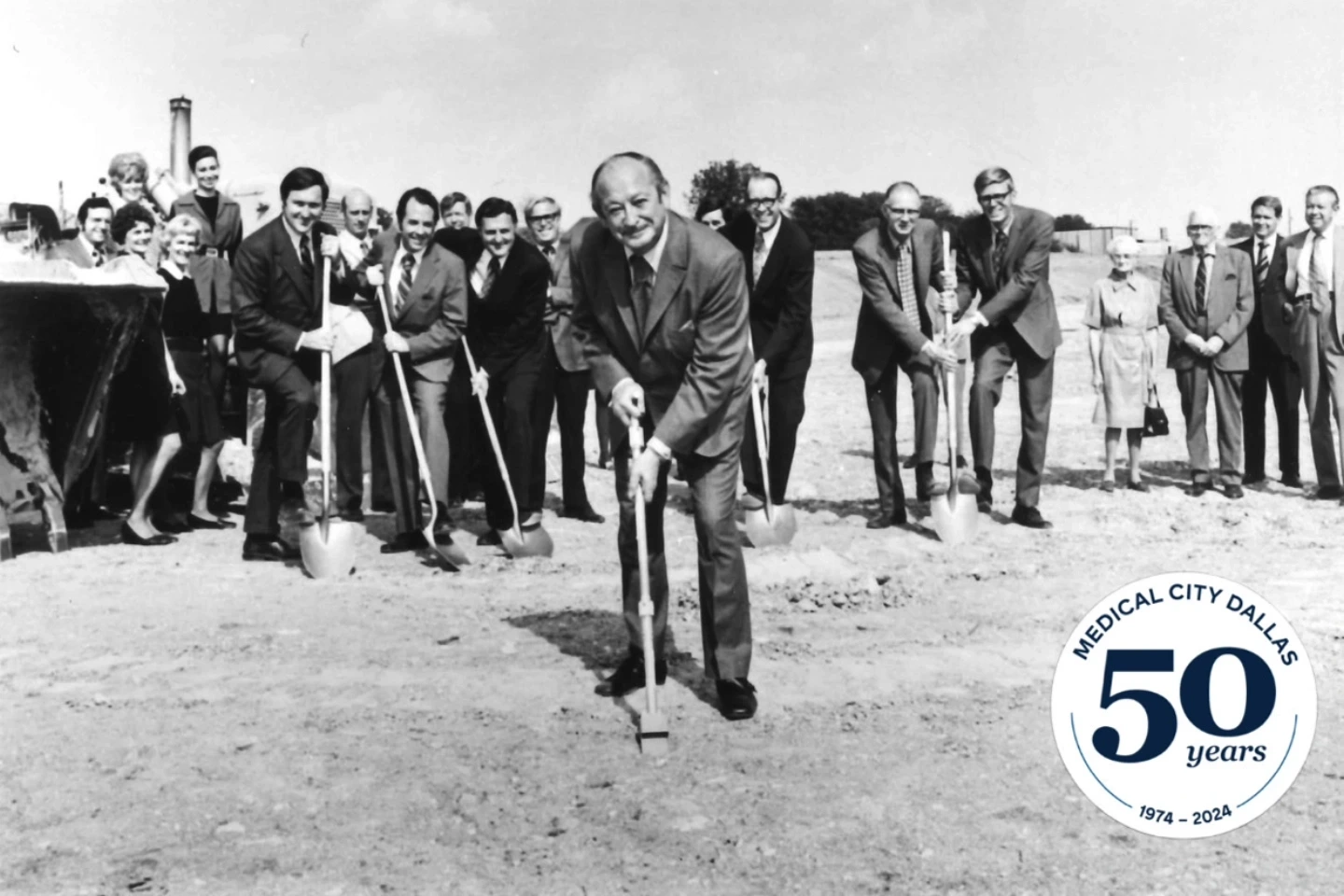 Photo of groundbreaking with shovels.
