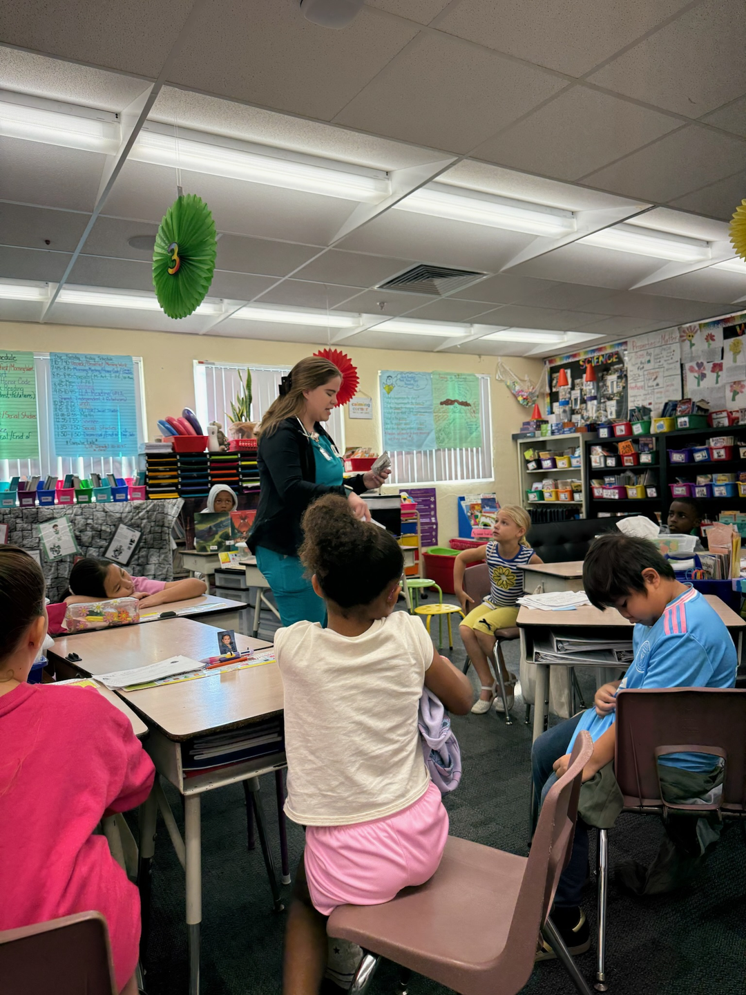 Nurse speaks to students in classroom